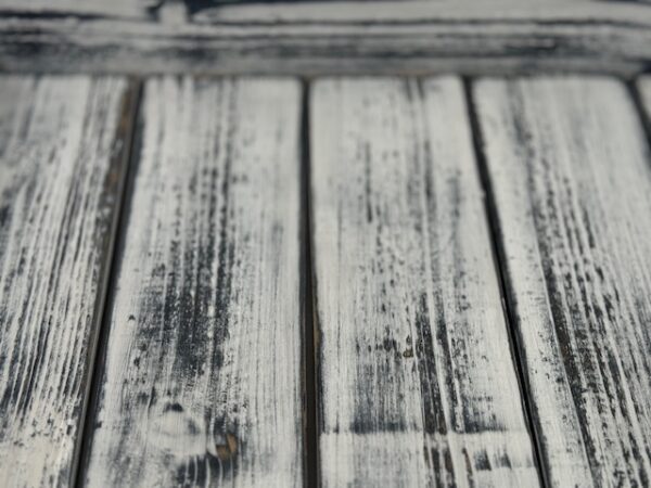 black and white rustic farmhouse serving tray made from cedar with black handles on either side