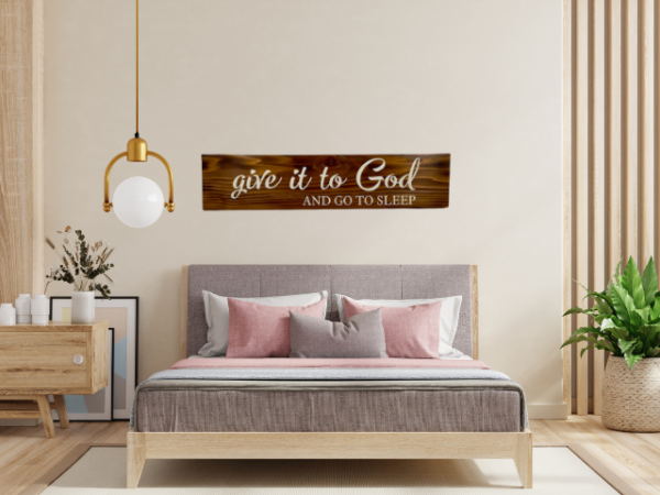 an Early American stained rustic sign made of cedar fence pickets that reads Give it to God and Go to Sleep