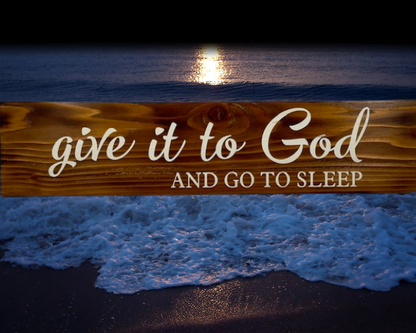 an Early American stained rustic sign made of cedar fence pickets that reads Give it to God and Go to Sleep