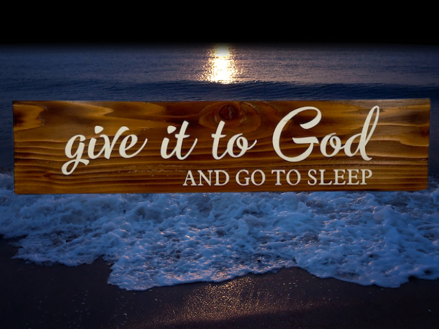 an Early American stained rustic sign made of cedar fence pickets that reads Give it to God and Go to Sleep