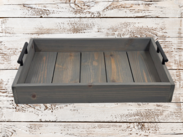 rustic gray serving tray that has been torched and then stained in weathered gray; black handles on both sides finish off this charming tray