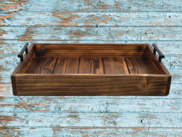 wooden rustic serving tray made from cedar and stained in Early American stain; black handles are added to each side for a farmhouse appeal