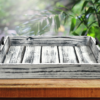 black and white rustic farmhouse serving tray made from cedar with black handles on either side