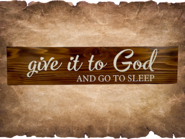 an Early American stained rustic sign made of cedar fence pickets that reads Give it to God and Go to Sleep