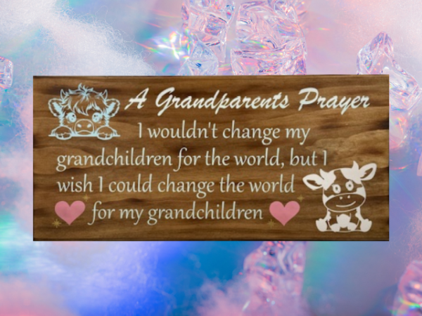 beautiful lightly brown stained sign that is titled A Grandparents Prayer - and reads "I wouldn't change my grandchildren for the world but I wish I could change the world for my grandchildren - in pastel colors