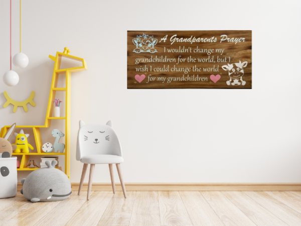 beautiful lightly brown stained sign that is titled A Grandparents Prayer - and reads "I wouldn't change my grandchildren for the world but I wish I could change the world for my grandchildren - in pastel colors