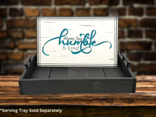 Serving tray insert - white background with dark gray and teal wording that says Always stay humble and kind