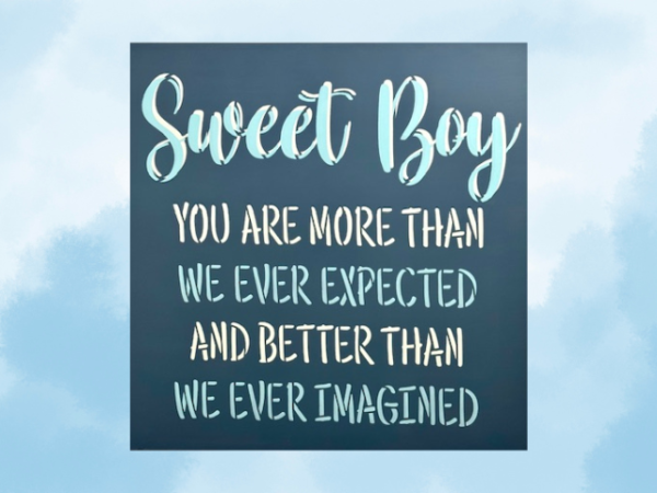 Dark blue, light blue and white baby boy nursery sign that is titled "sweet boy"