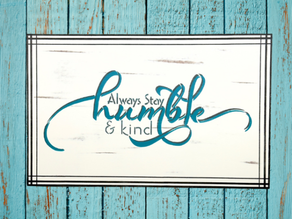 Serving tray insert - white background with dark gray and teal wording that says Always stay humble and kind