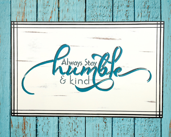 Serving tray insert - white background with dark gray and teal wording that says Always stay humble and kind