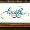 Serving tray insert - white background with dark gray and teal wording that says Always stay humble and kind