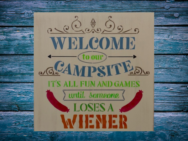 rustic camping sign that reads "Welcome to our campsite, it's all fun and games until someone loses a weiner