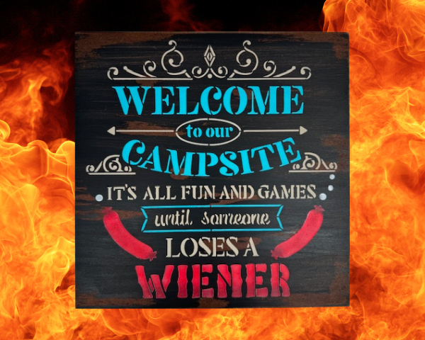 rustic camping sign that reads "Welcome to our campsite, it's all fun and games until someone loses a wiener