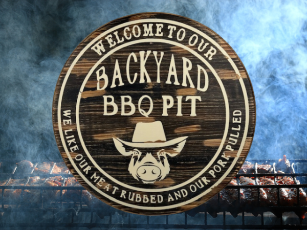 wood round pine rustic BBQ sign that reads Welcome to our Backyard BBQ - we like our meat rubbed and our pork pulled