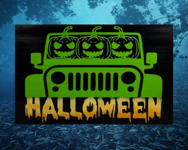 Halloween tray insert featuring three scary pumpkin heads driving a yellow-green Jeep with the words "Halloween" in yellow, white, and orange at the bottom - all on a black background