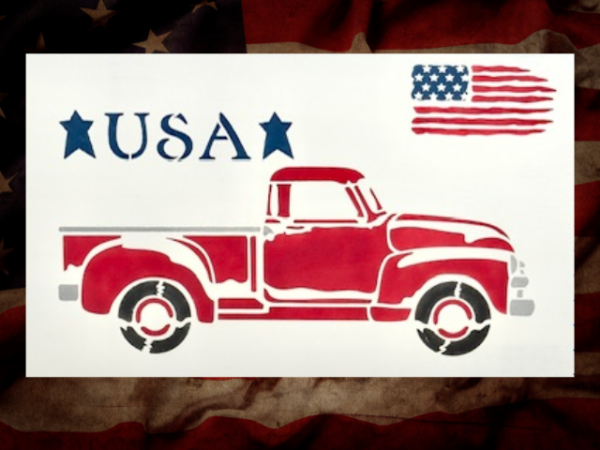 patriotic and vintage sign featuring an old red truck with the words "USA" and a USA flag above the truck sitting on a crisp white background