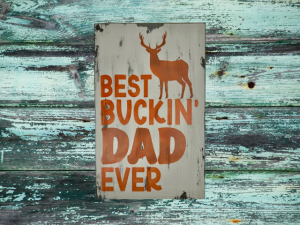 distressed hunting sign that reads Best Buckin Dad Ever