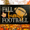 beautiful autumn rustic background sign that reads fall, family, football in colorful lettering with a football on the side