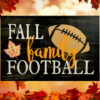 beautiful autumn rustic background sign that reads fall, family, football in colorful lettering with a football on the side