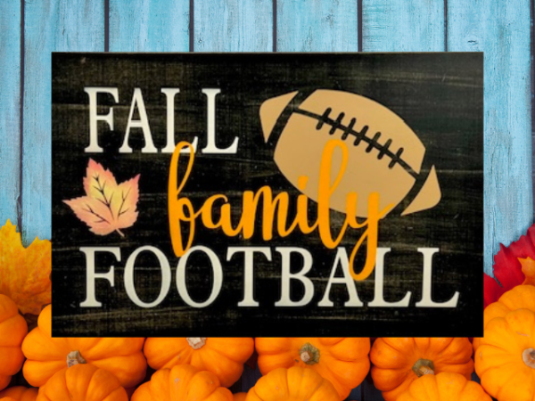 beautiful autumn rustic background sign that reads fall, family, football in colorful lettering with a football on the side