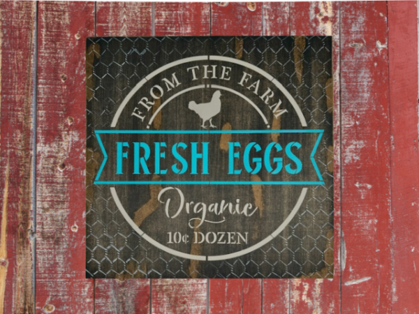 brown rustic and distressed sign with vibrant teal and tan lettering - sign says Fresh Eggs from the Farm