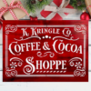 beautiful Christmas sign with a red and black background and sharp white lettering that says K. Kringle Co Coffee & Cocoa