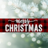 festive Christmas sign with black and red plaid background and the worlds "Merry Christmas" centered in bold white cursive lettering
