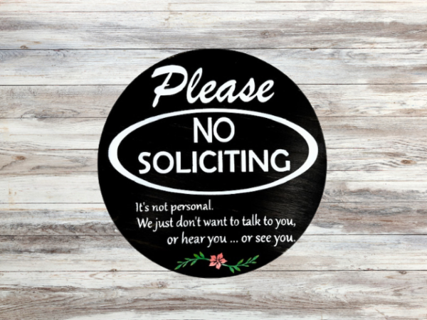 Please No Soliciting pine wood round sign that says Please No Soliciting - It's not personal, we just dont want to talk to you, or hear you, or see you. Black background and crisp white lettering finish off this cheerful sign