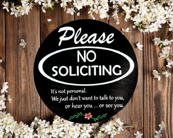 Please No Soliciting pine wood round sign that says Please No Soliciting - It's not personal, we just dont want to talk to you, or hear you, or see you. Black background and crisp white lettering finish off this cheerful sign