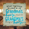 grandma's sign with a distressed mushroom gray background that says "what happens at grandma's house stays at grandma's house in teal lettering outlined in dark gray