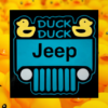 sign with a black background and teal jeep that has two bright yellow ducks in the corners