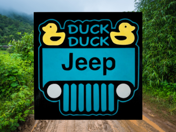 sign with a black background and teal jeep that has two bright yellow ducks in the corners