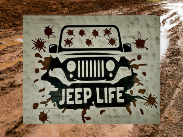 Rugged and muddy Jeep sign - Jeep is black with mud all over the windshield and roadway, sign says Jeep Life