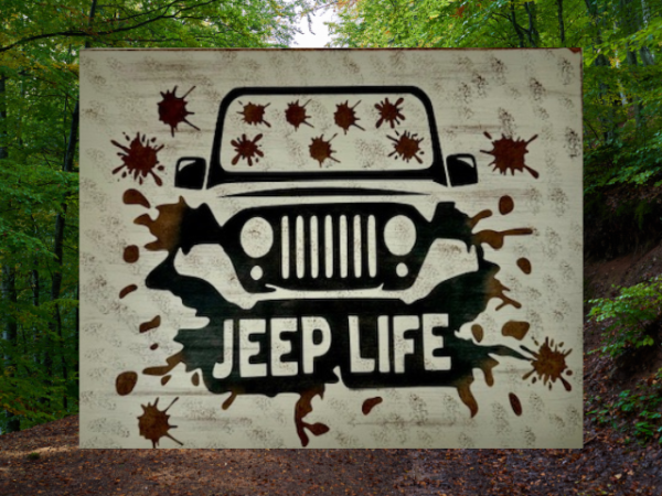 Rugged and muddy Jeep sign - Jeep is black with mud all over the windshield and roadway, sign says Jeep Life