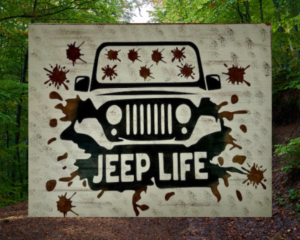 Rugged and muddy Jeep sign - Jeep is black with mud all over the windshield and roadway, sign says Jeep Life