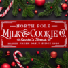 festive holiday sign with a Christmas red background and crisp white lettering that says "North Pole Milk & Cookies Co"
