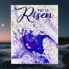 beautiful 8x10 fluid art canvas in a Dutch Pour - colors are shades of purple and white with the words "He Is Risen" handpainted in deep purple