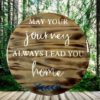 stunning pine wood lazy Susan - wood has been torched, stained in Dark Walnut and painted Ivory lettering that reads "May Your Journey Always Lead You Home" - finished in epoxy resin