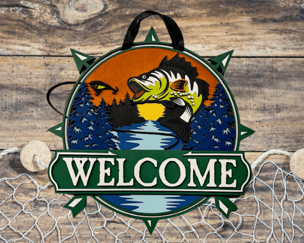 Vibrant laser-cut "Welcome Fishing" sign with leaping fish in bold blues, fiery oranges, and bright yellow-greens.
