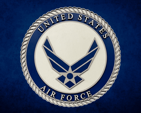 3D laser cut wood U.S. Air Force sign with a blue and gray Air Force emblem centered on a white background and a light gray laser cut frame