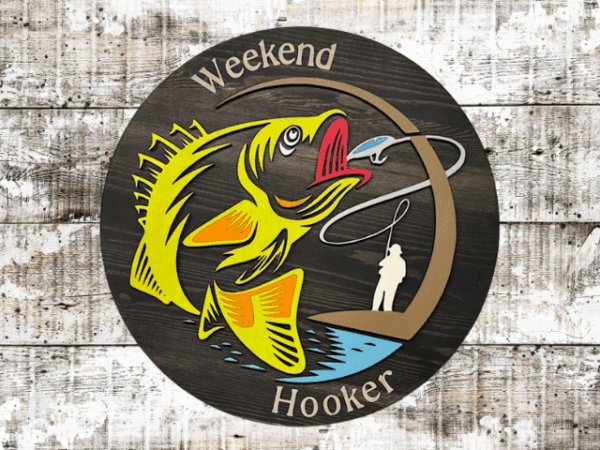 a rustic pine wood sign with a black stain finish, featuring laser-cut "Weekend Hooker" text, a vibrant lime green fish, and a fisherman silhouette, blending bold humor and fishing charm